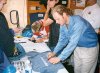 Hale, Brian, and Alex signing autographs after the show at MixFest (Boston, MA - 10/11/98)